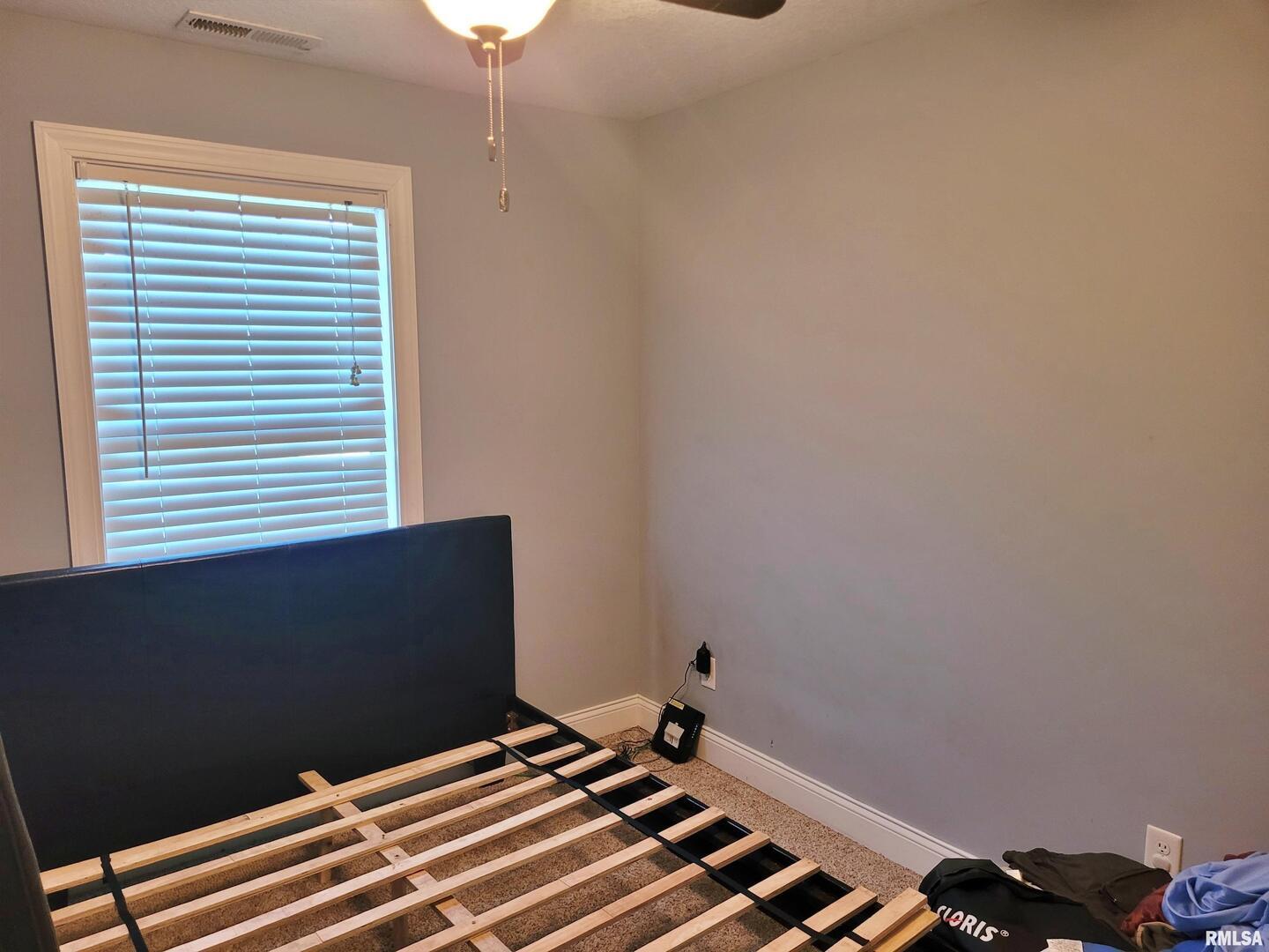 42 County Line Road Grand Chain, IL 62941 - Photo 31 of 40 a bedroom with a bed and a window