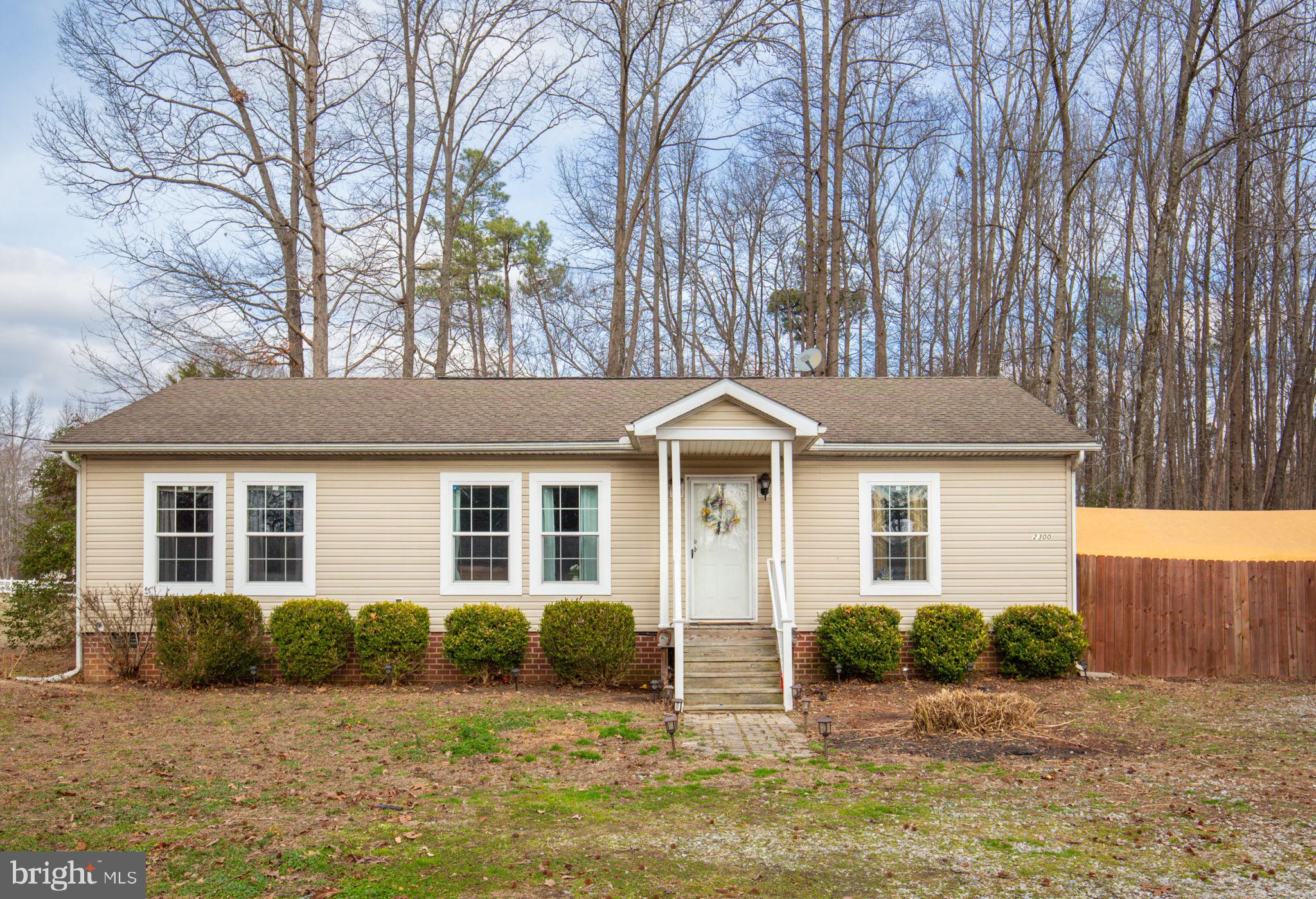 2300 Osborne Road Chester, VA 23831 - Photo 2 of 26 front view of a house with a yard
