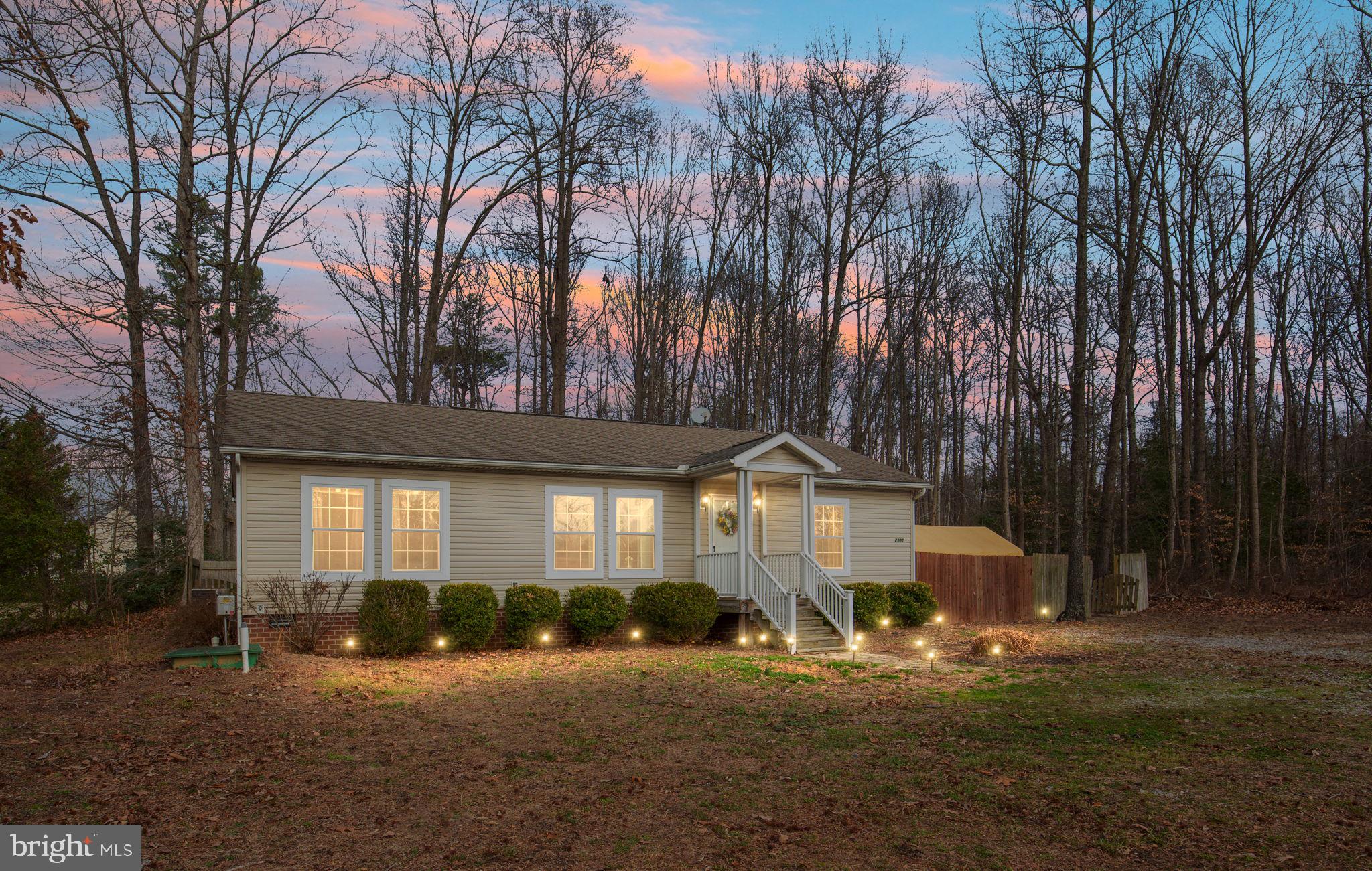 2300 Osborne Road Chester, VA 23831 - Photo 26 of 26 a front view of a house with a yard and garage