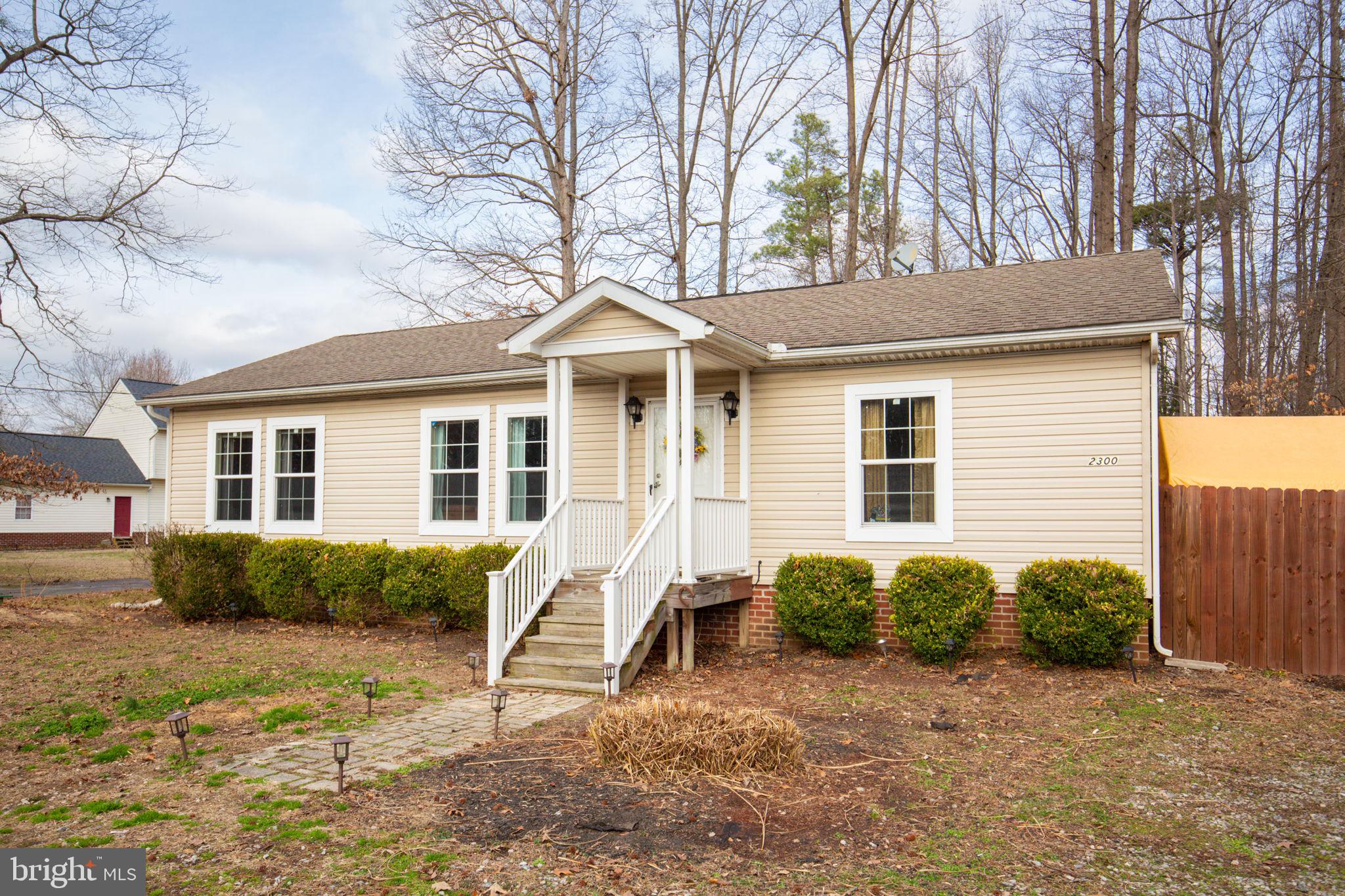 2300 Osborne Road Chester, VA 23831 - Photo 3 of 26 a view of a house with a yard and sitting area