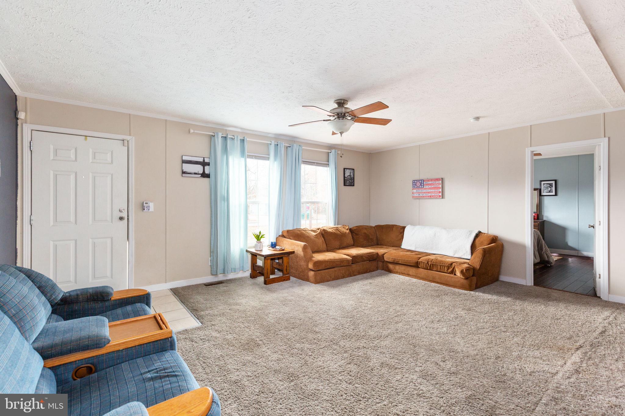 2300 Osborne Road Chester, VA 23831 - Photo 5 of 26 a living room with furniture and a window