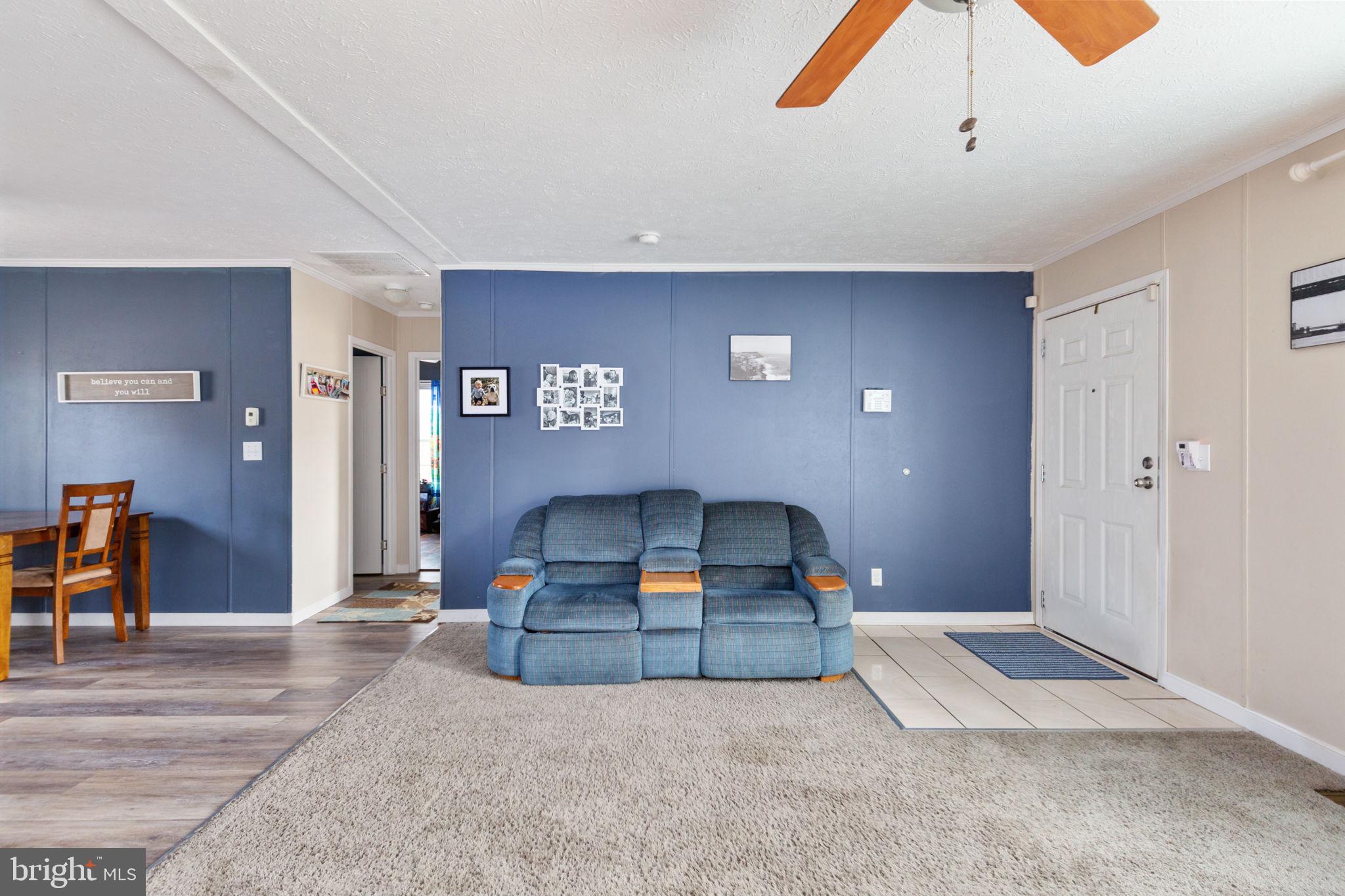 2300 Osborne Road Chester, VA 23831 - Photo 7 of 26 a bedroom with a bed and a night stand