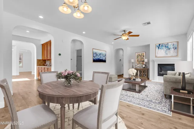 a view of a dining room with furniture window and outside view