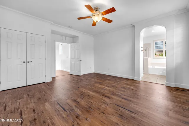 a view of a swimming pool with a yard