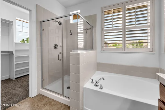 a view of a wooden deck and a backyard