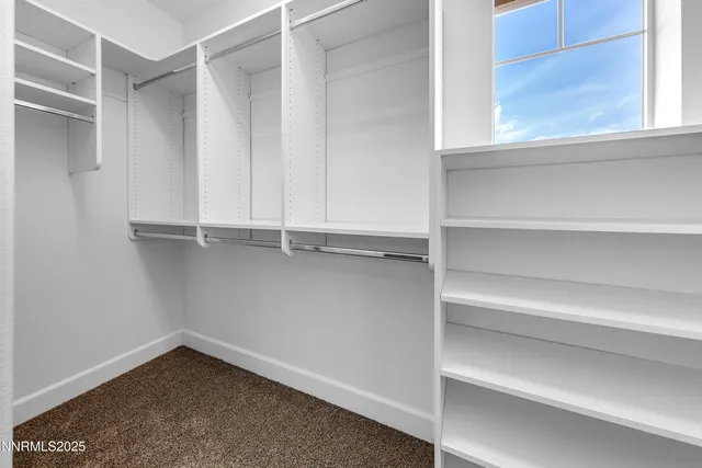 an aerial view of multiple houses with yard