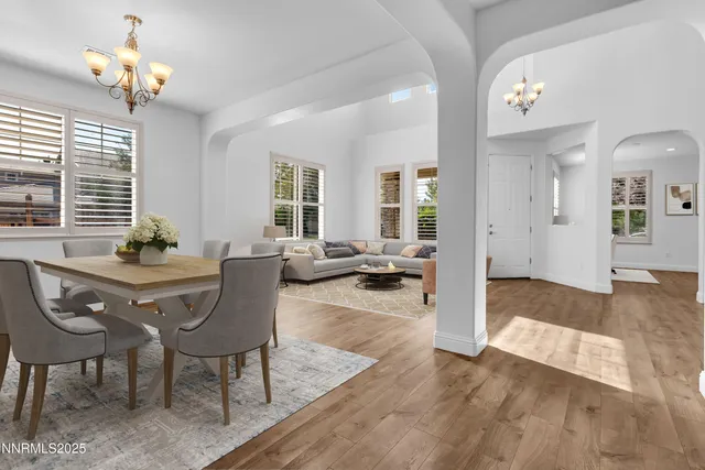 a view of empty room with wooden floor and cabinet