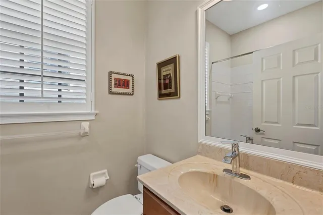 a bathroom with a sink and a toilet