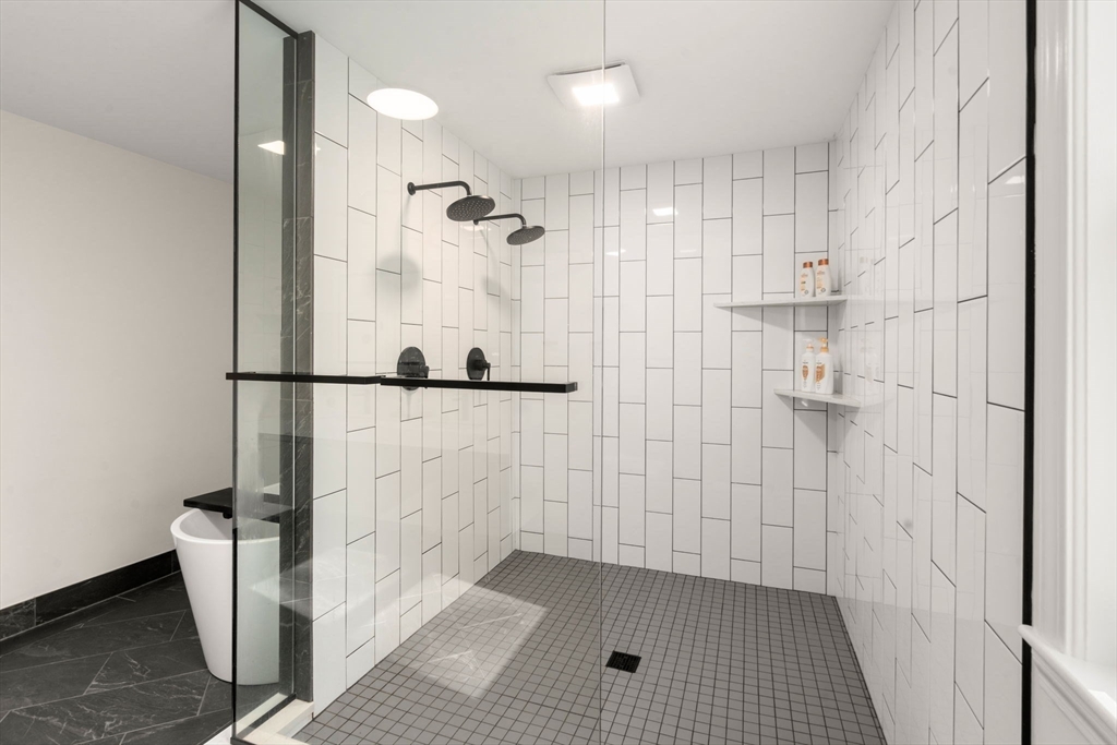 23 Bubbling Brook Road Walpole, MA 02081 - Photo 24 of 41 a bathroom with a shower