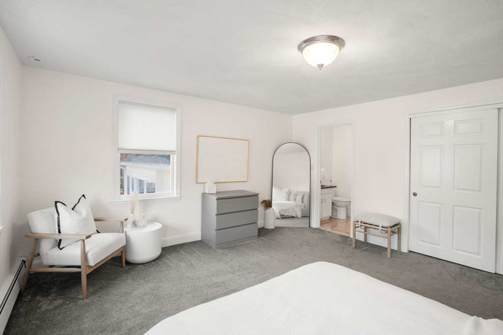 23 Bubbling Brook Road Walpole, MA 02081 - Photo 28 of 41 a living room with furniture and a window