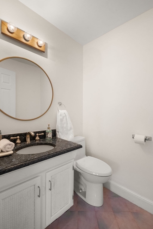23 Bubbling Brook Road Walpole, MA 02081 - Photo 29 of 41 a bathroom with a granite countertop sink and a mirror