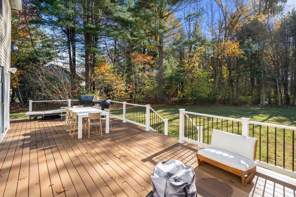 23 Bubbling Brook Road Walpole, MA 02081 - Photo 34 of 41 a view of a chairs and table on the deck