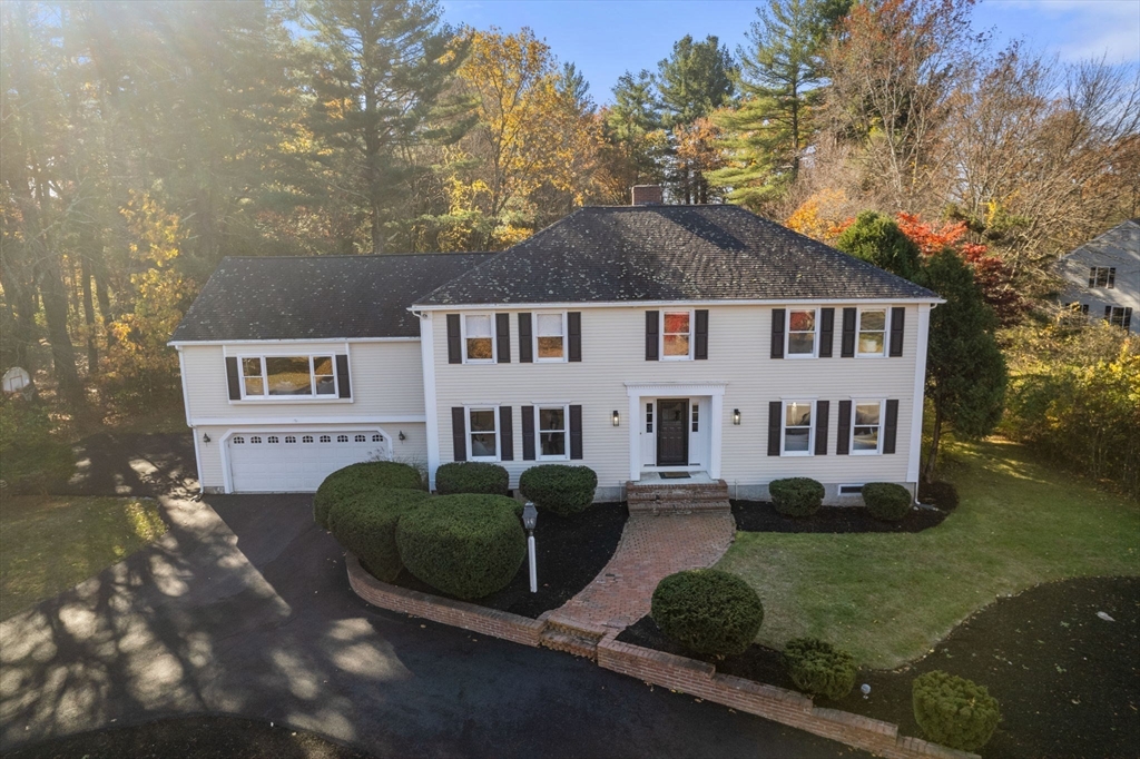 23 Bubbling Brook Road Walpole, MA 02081 - Photo 36 of 41 a front view of a house with garden