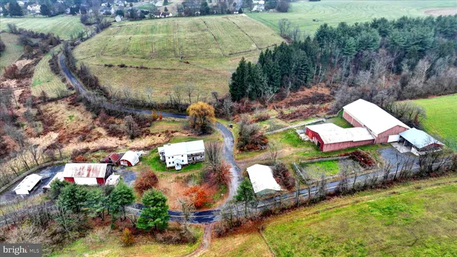 a backyard of a house with outdoor seating