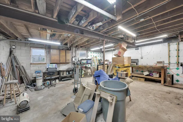 a view of a house with a swimming pool and a big yard