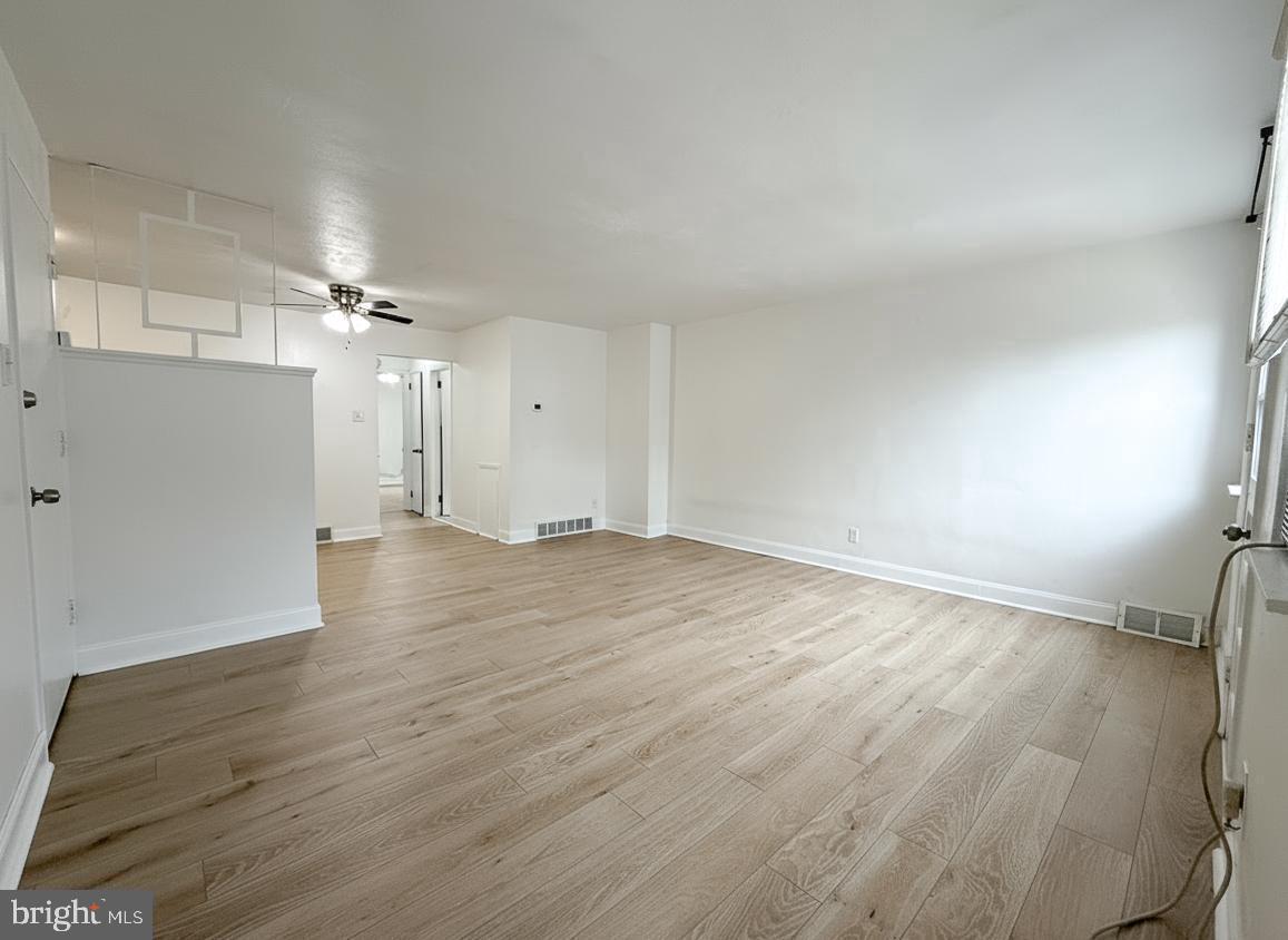 7332 Ruskin Road Philadelphia, PA 19151 - Photo 12 of 20 a view of empty room with wooden floor