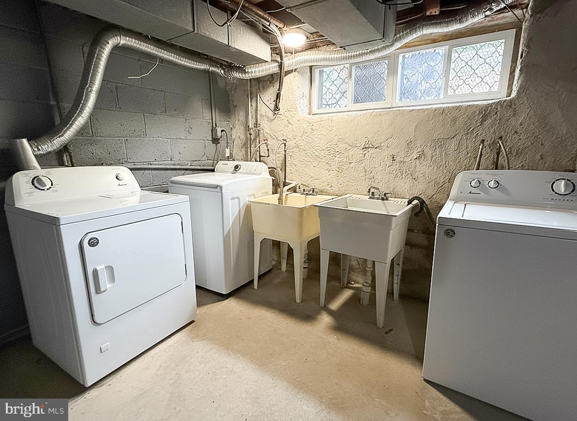 7332 Ruskin Road Philadelphia, PA 19151 - Photo 19 of 20 a utility room with dryer and washer