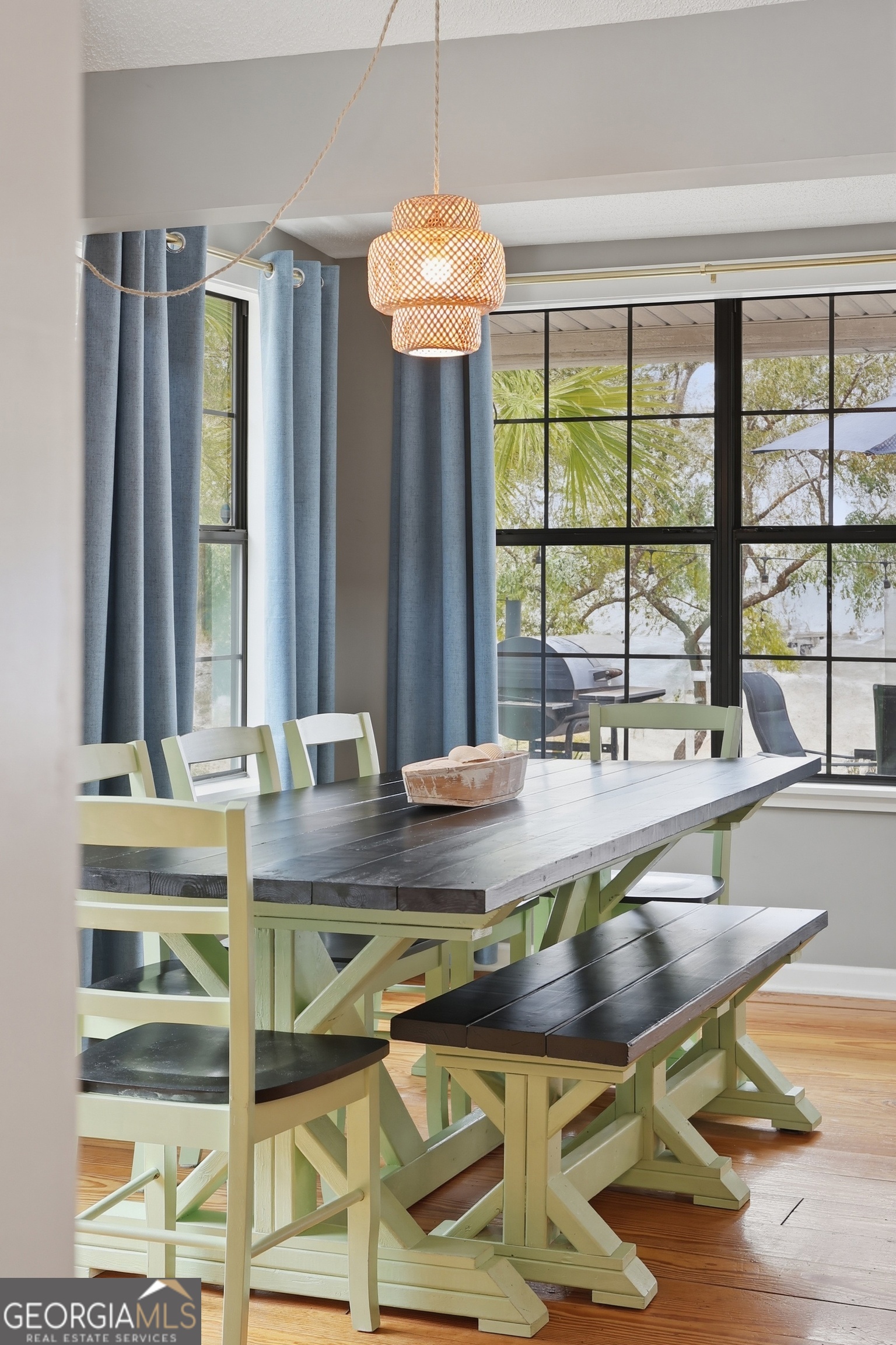 1629 South River Drive Townsend, GA 31331 - Photo 26 of 64 a dining table with chairs and window