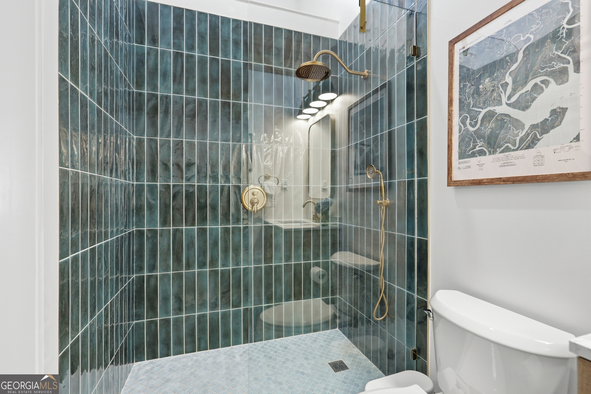 1629 South River Drive Townsend, GA 31331 - Photo 35 of 64 a bathroom with a toilet and shower