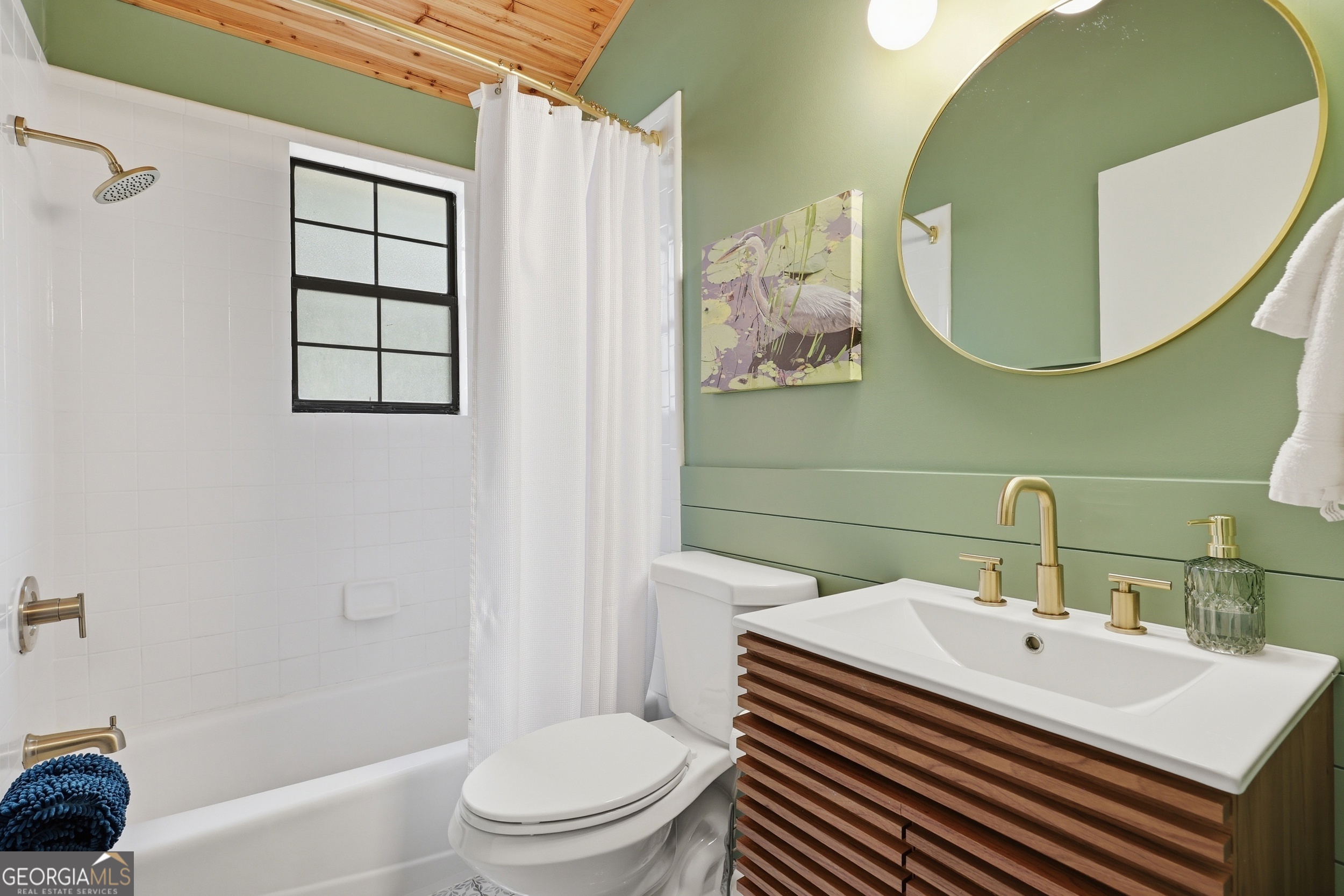 1629 South River Drive Townsend, GA 31331 - Photo 42 of 64 a bathroom with a sink toilet and shower
