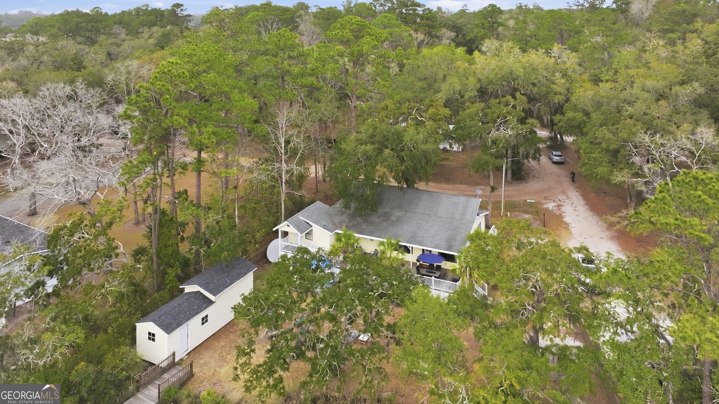 1629 South River Drive Townsend, GA 31331 - Photo 56 of 64 an aerial view of a house with a yard