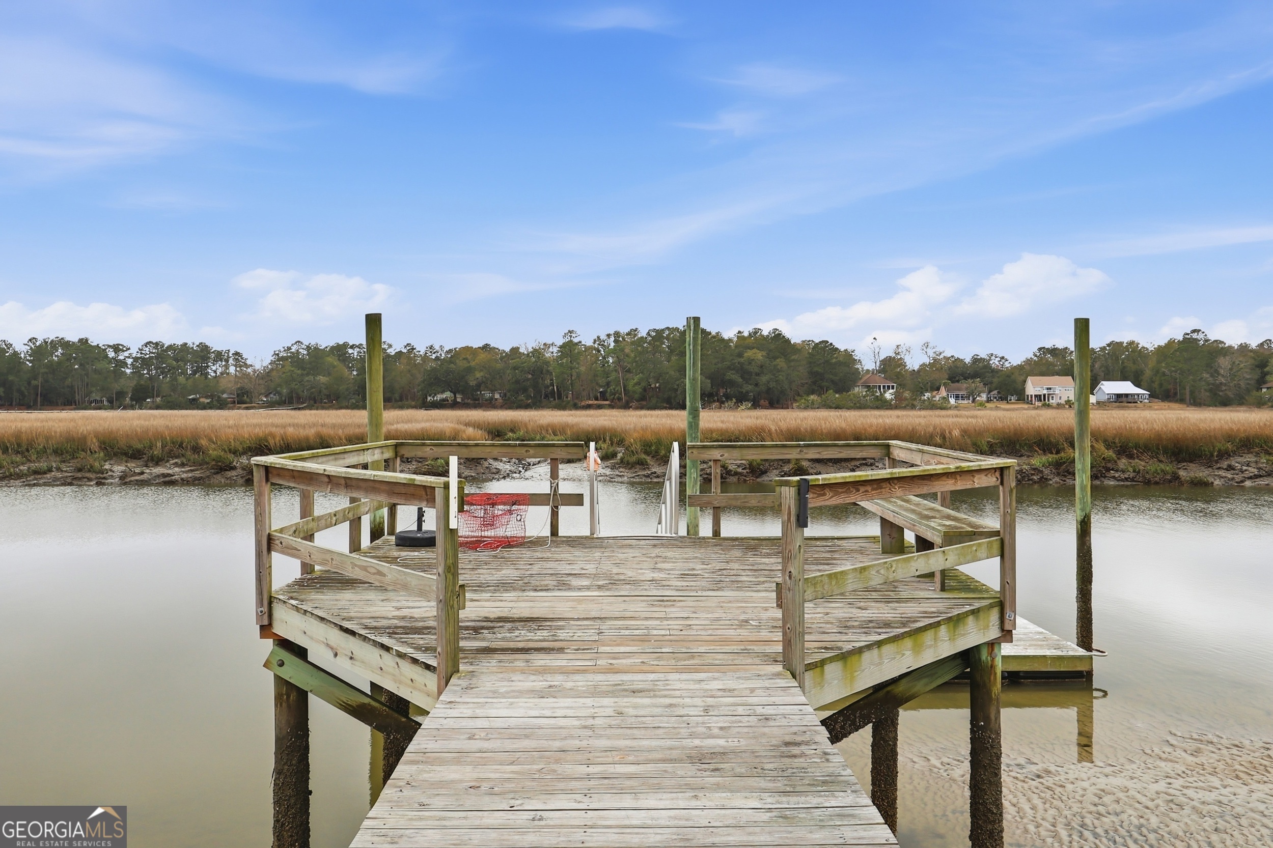 1629 South River Drive Townsend, GA 31331 - Photo 6 of 64 a view of a lake with outdoor seating