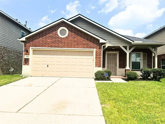 a front view of house with yard