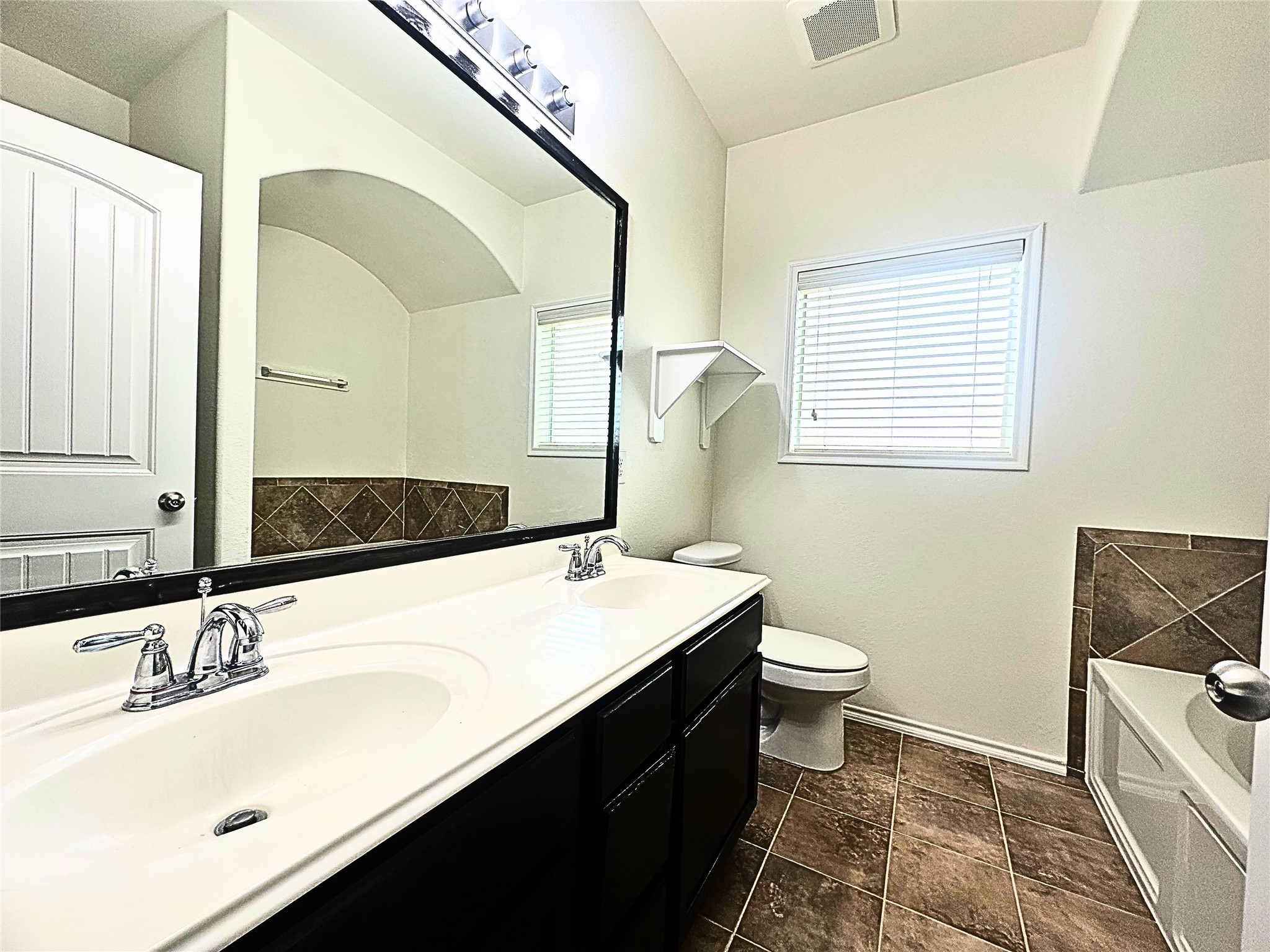 8218 Nagy Hill Street Spring, TX 77379 - Photo 15 of 30 a bathroom with a sink and a mirror