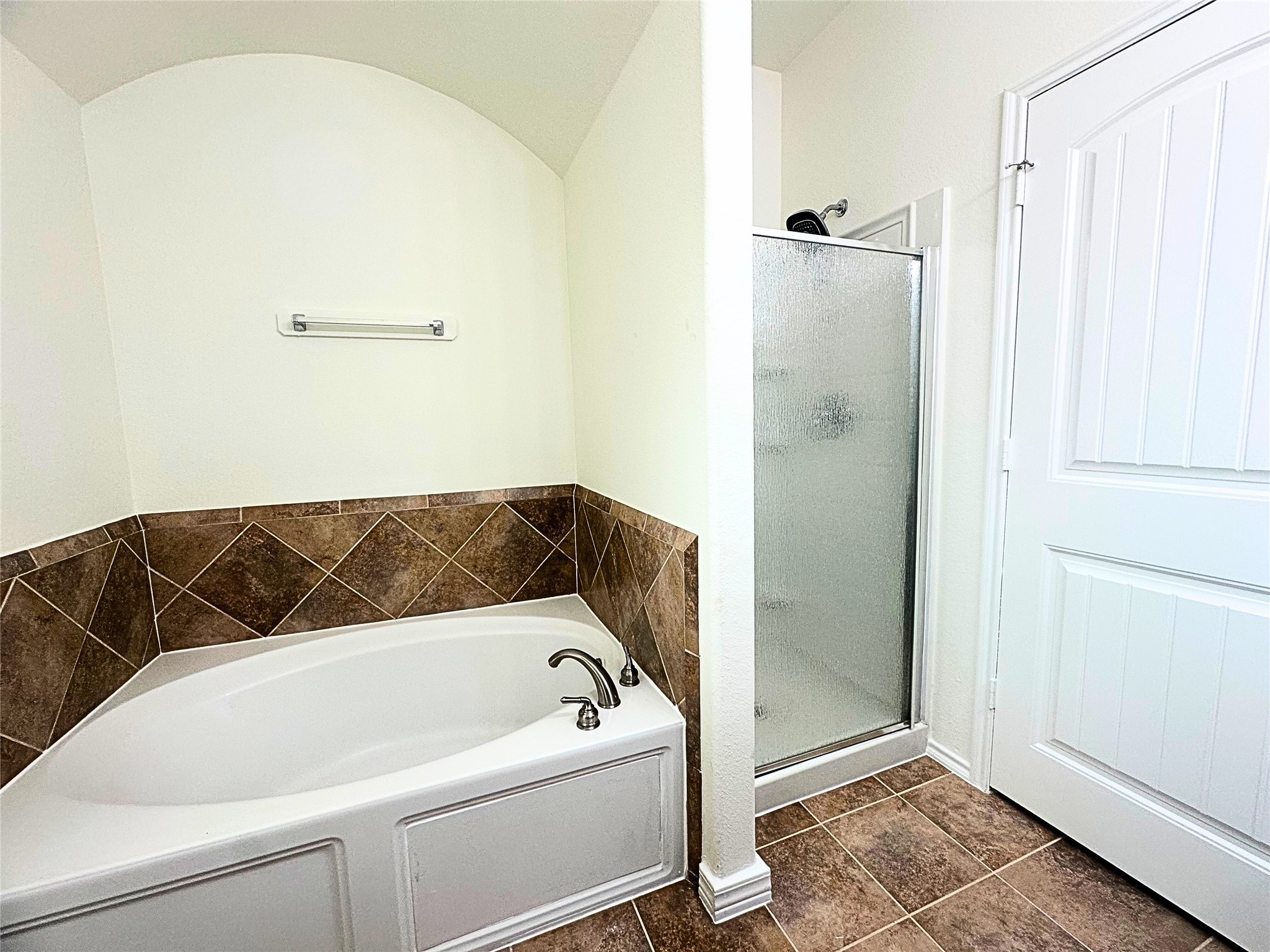8218 Nagy Hill Street Spring, TX 77379 - Photo 18 of 30 a bathroom with a bathtub and shower