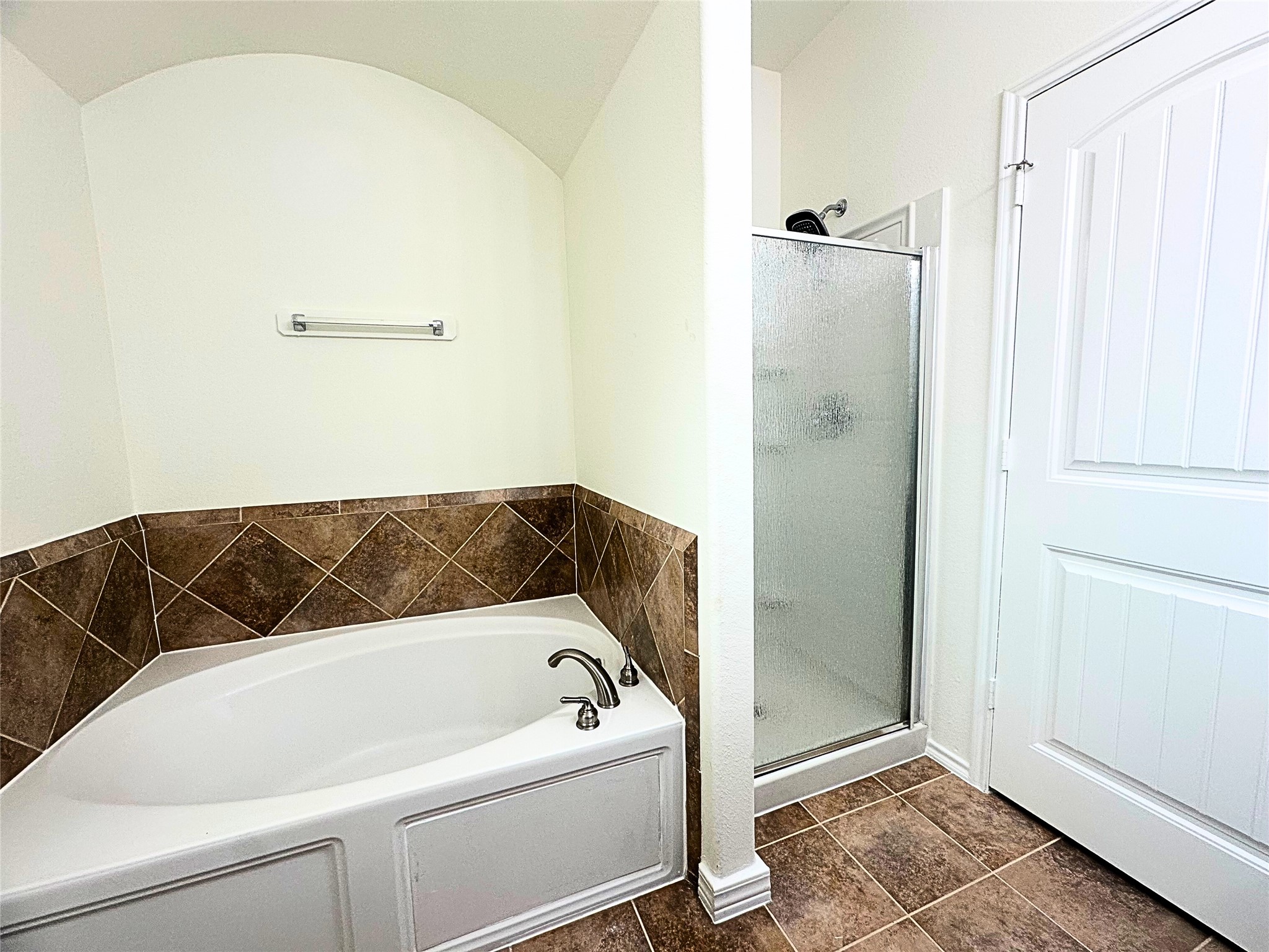 8218 Nagy Hill Street Spring, TX 77379 - Photo 18 of 30 a bathroom with a bathtub and shower