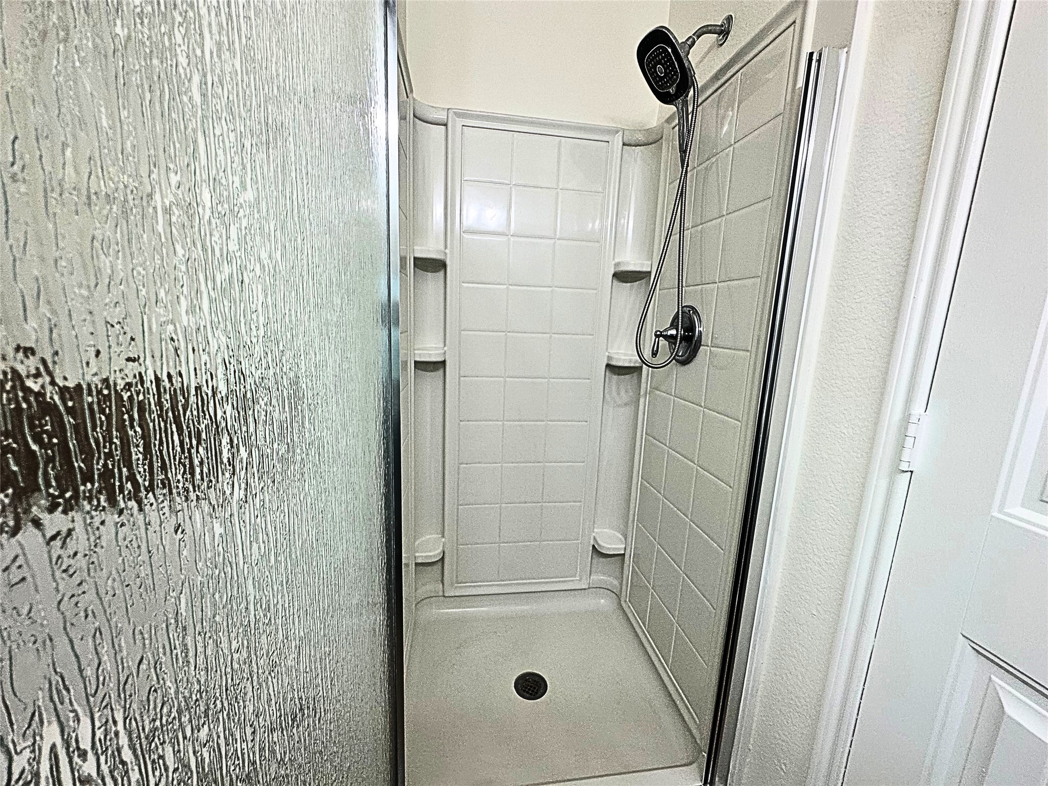 8218 Nagy Hill Street Spring, TX 77379 - Photo 19 of 30 a bathroom with a shower