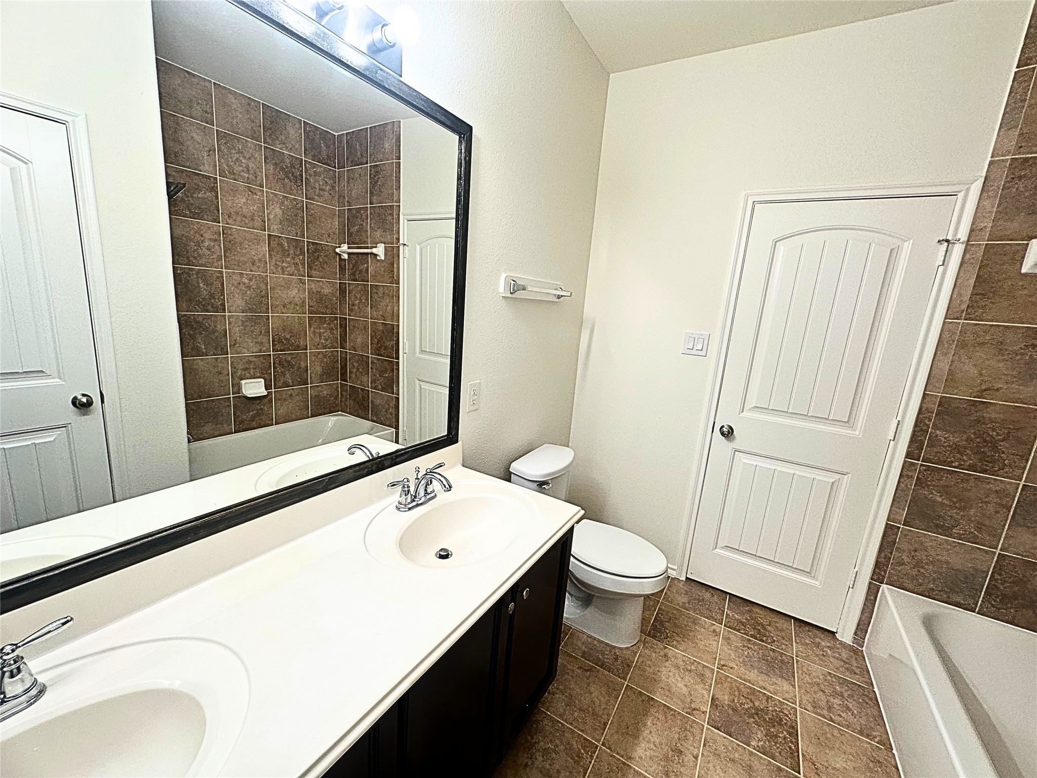 8218 Nagy Hill Street Spring, TX 77379 - Photo 25 of 30 a bathroom with a sink and a mirror