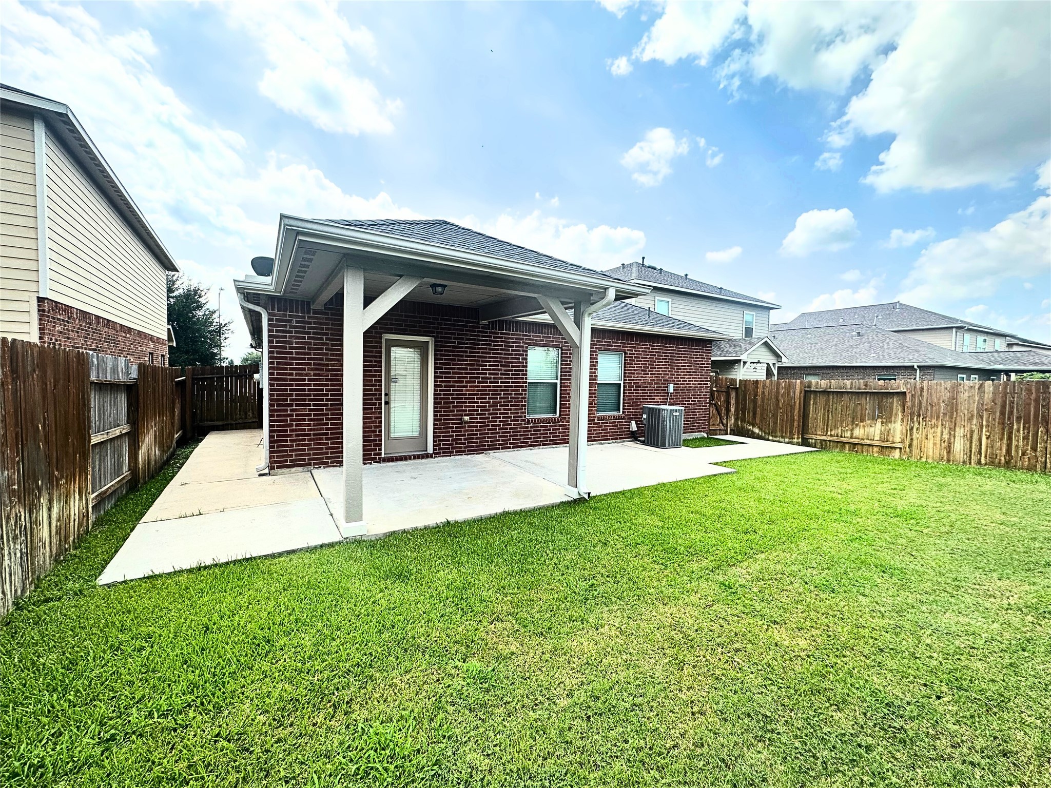 8218 Nagy Hill Street Spring, TX 77379 - Photo 29 of 30 a view of a house with a yard and front view of a house