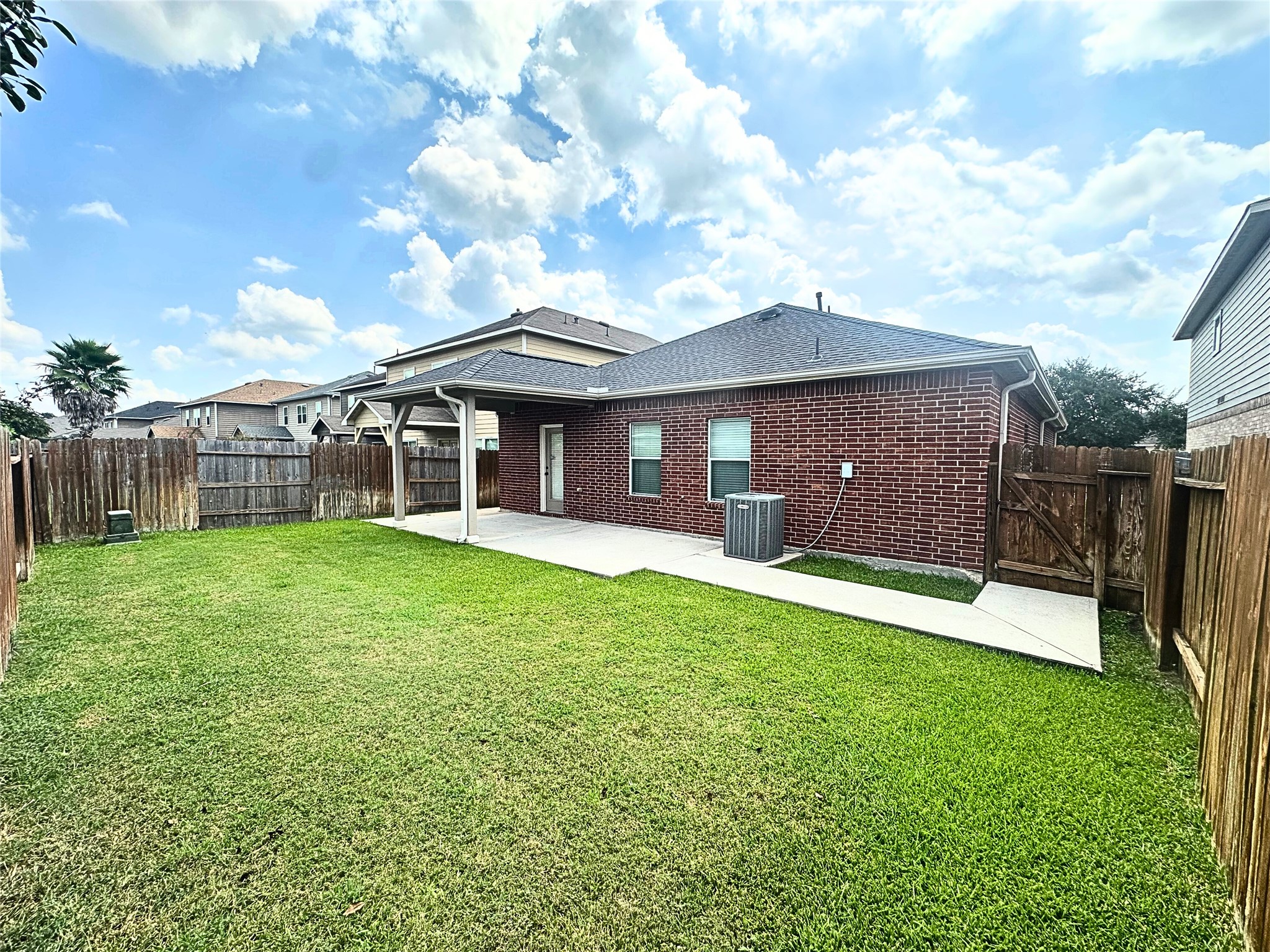 8218 Nagy Hill Street Spring, TX 77379 - Photo 30 of 30 a view of a house with a yard and sitting area