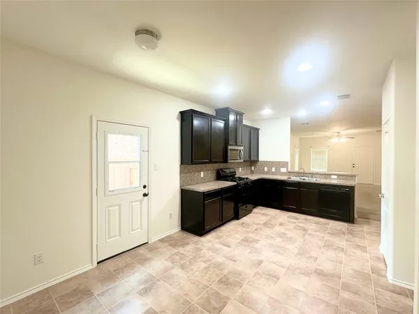 a large bathroom with a sink a large mirror and a shower