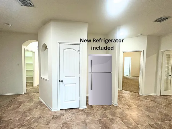 a view of a utility room with closet