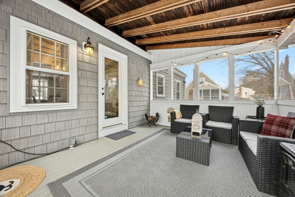 102 Spruce Street Framingham, MA 01701 - Photo 18 of 30 a living room with furniture and a window