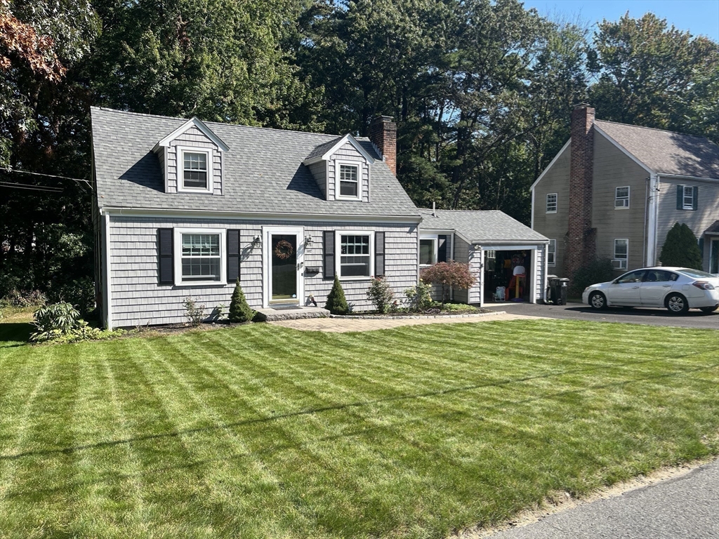 102 Spruce Street Framingham, MA 01701 - Photo 26 of 30 a front view of a house with a garden