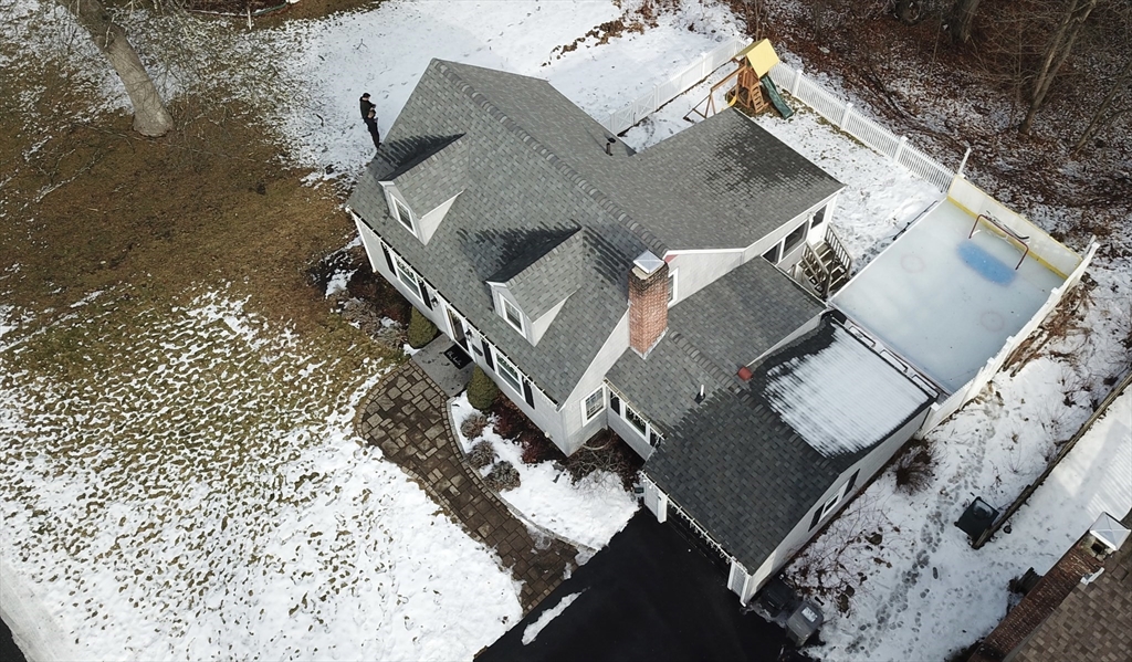 102 Spruce Street Framingham, MA 01701 - Photo 27 of 30 an aerial view of a house with a yard