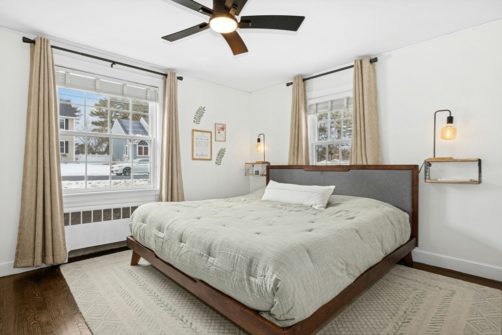 102 Spruce Street Framingham, MA 01701 - Photo 8 of 30 a bedroom with a bed and window