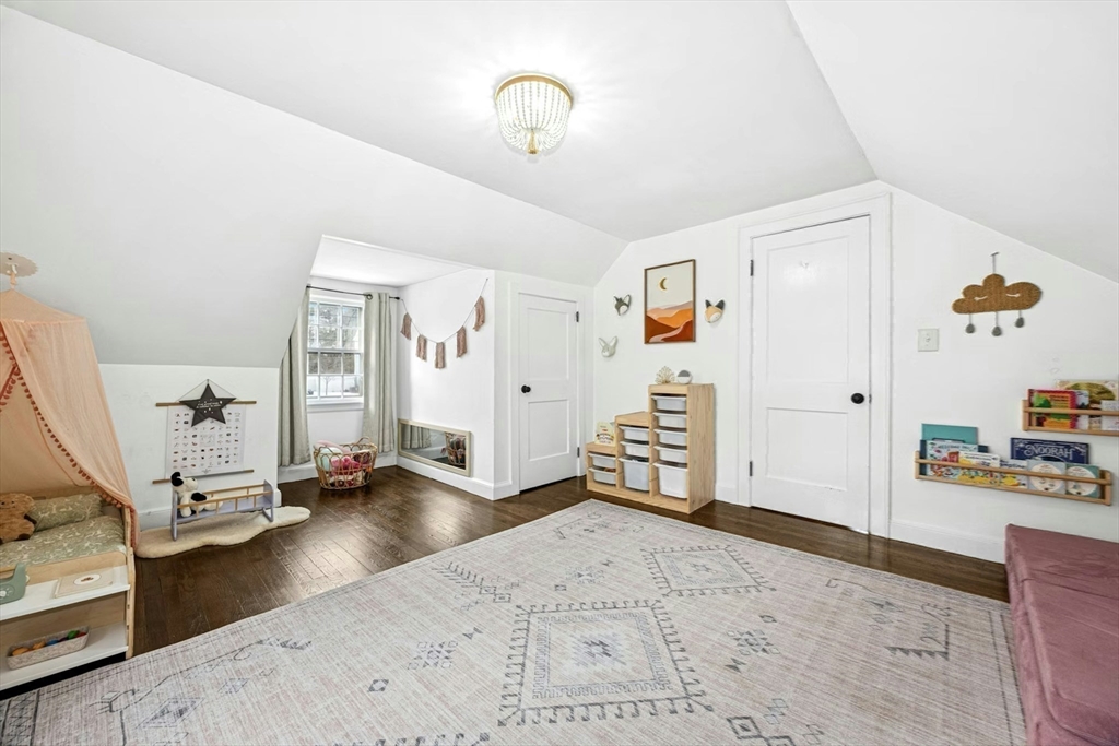 102 Spruce Street Framingham, MA 01701 - Photo 10 of 30 a view of a livingroom with gym equipment