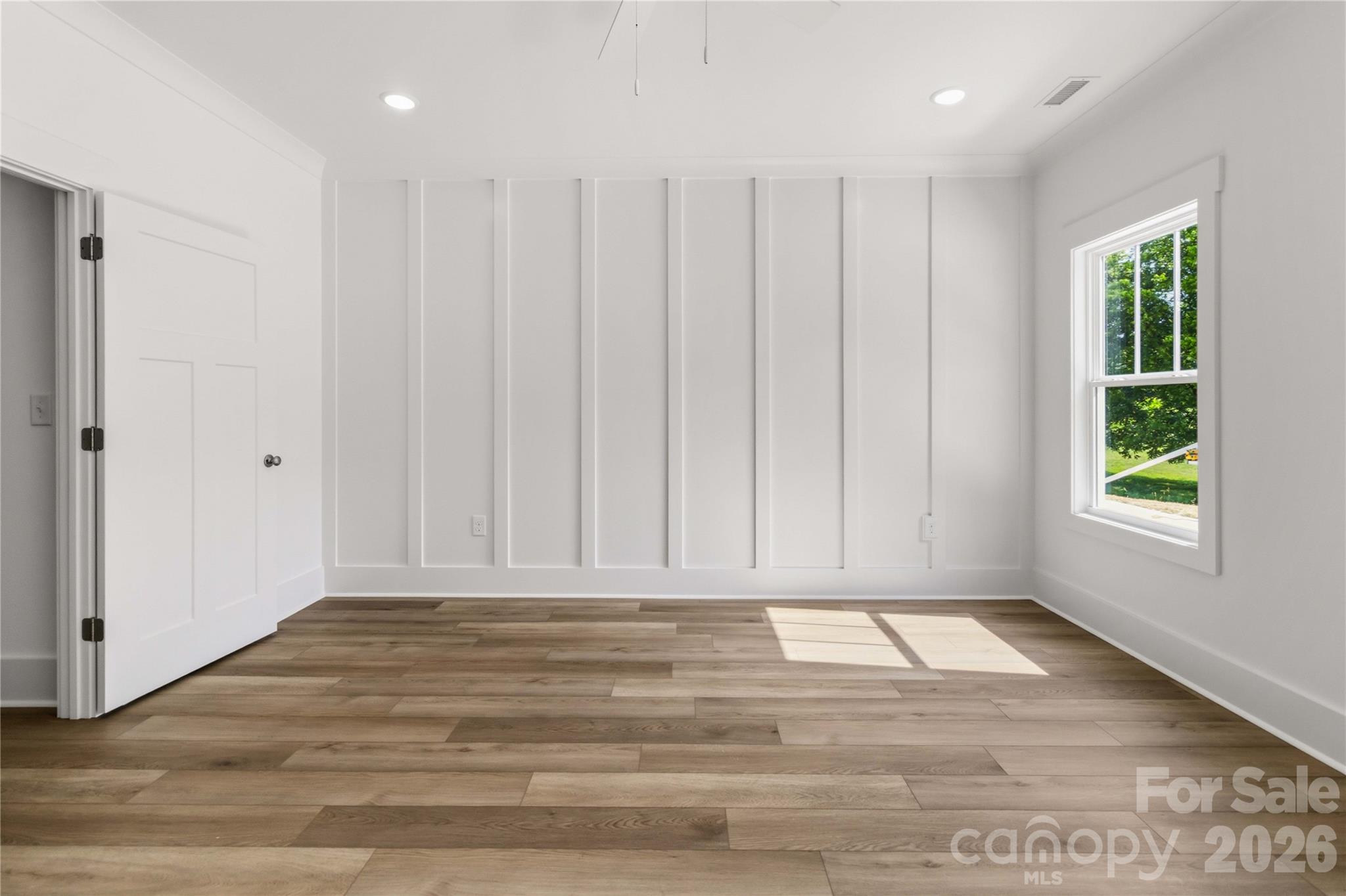 352 Adams Road Clover, SC 29710 - Photo 16 of 38 a view of room with window and hardwood floor
