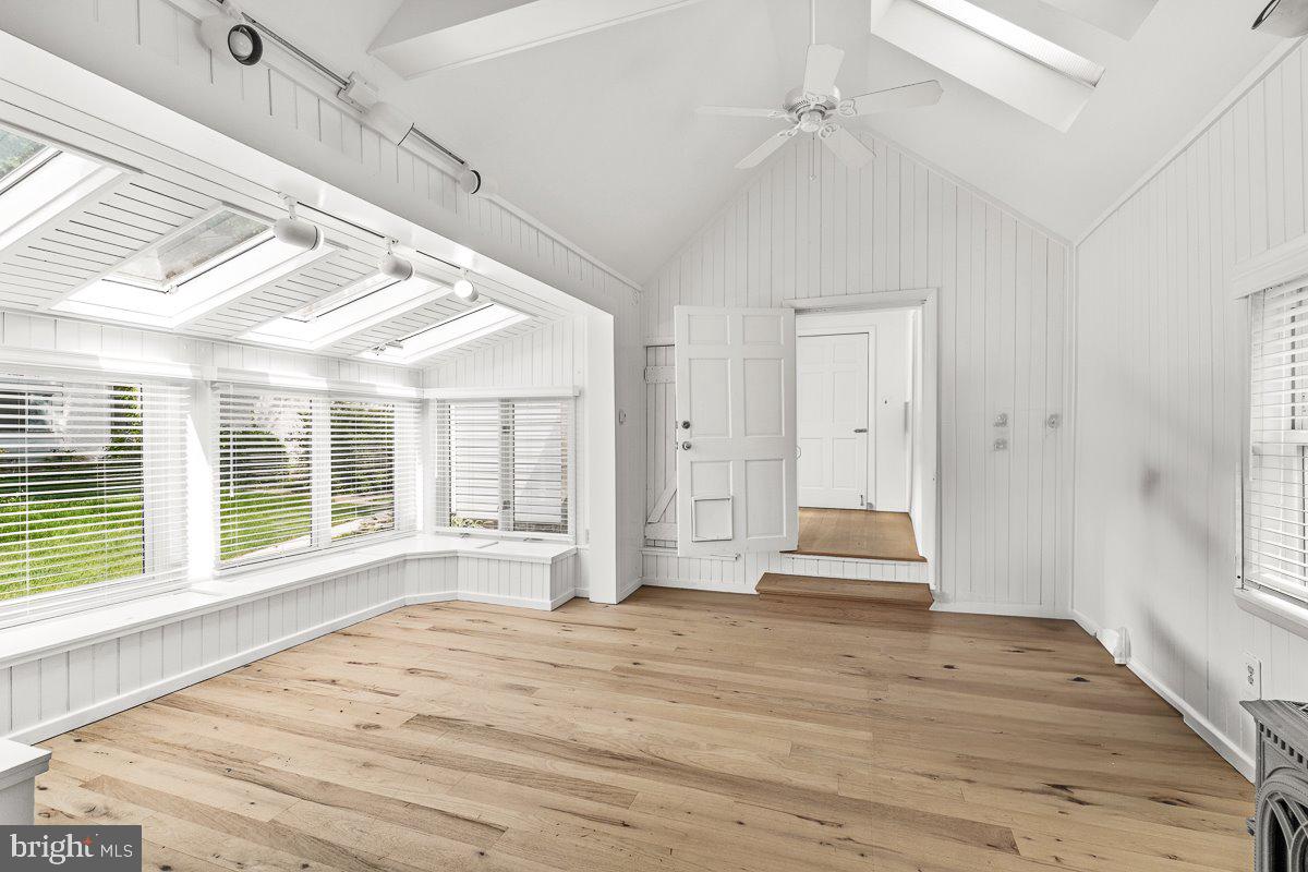 201 East Main Street Fairfield, PA 17320 - Photo 11 of 44 a view of empty room with wooden floor and fan