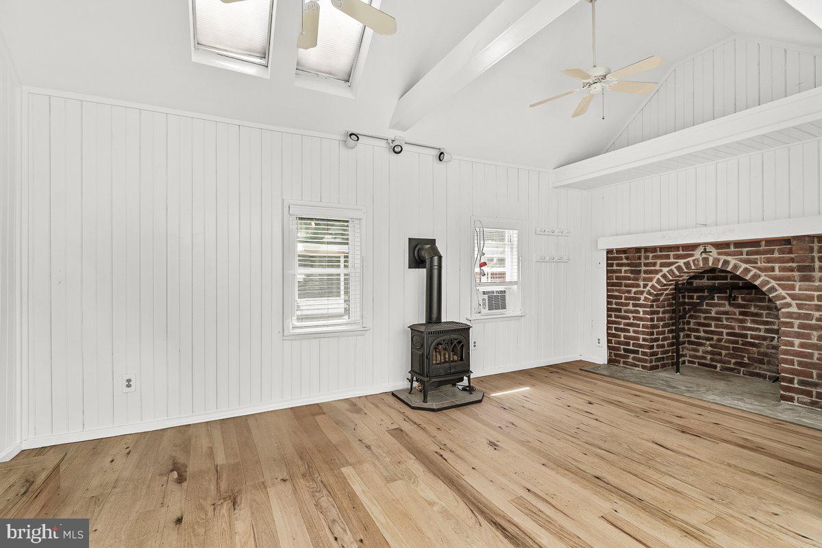 201 East Main Street Fairfield, PA 17320 - Photo 14 of 44 an empty room with wooden floor and windows