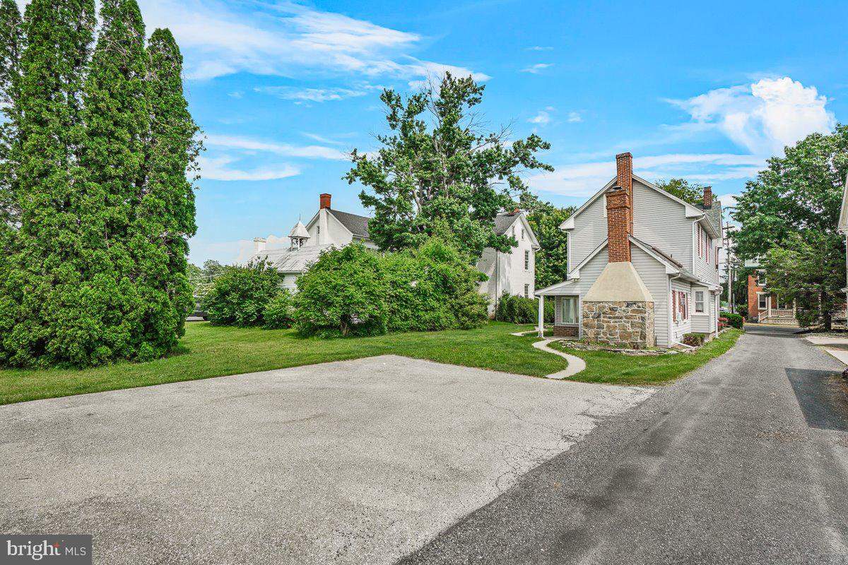 201 East Main Street Fairfield, PA 17320 - Photo 31 of 44 a view of a house with a big yard and large trees