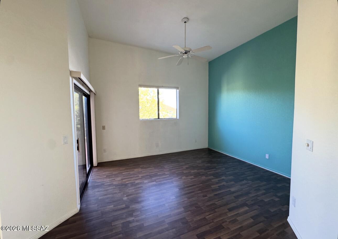 4998 North Valle Road Tucson, AZ 85750 - Photo 6 of 11 wooden floor in an empty room with a window