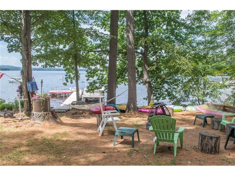 146 East Shore Beach Road Naples, ME 04055 - Photo 8 of 34 Firepit, toys, dock, pontoon boat,...