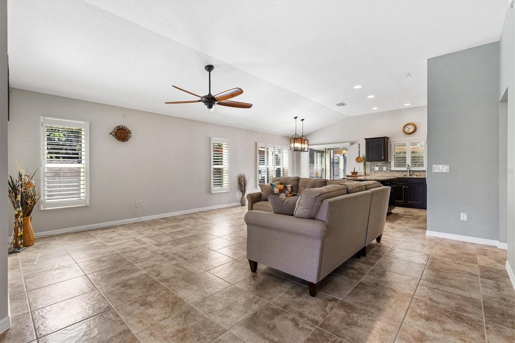 7351 Southeast 169th Cote Loop The Villages, FL 32162 - Photo 6 of 32 a living room with furniture and a window