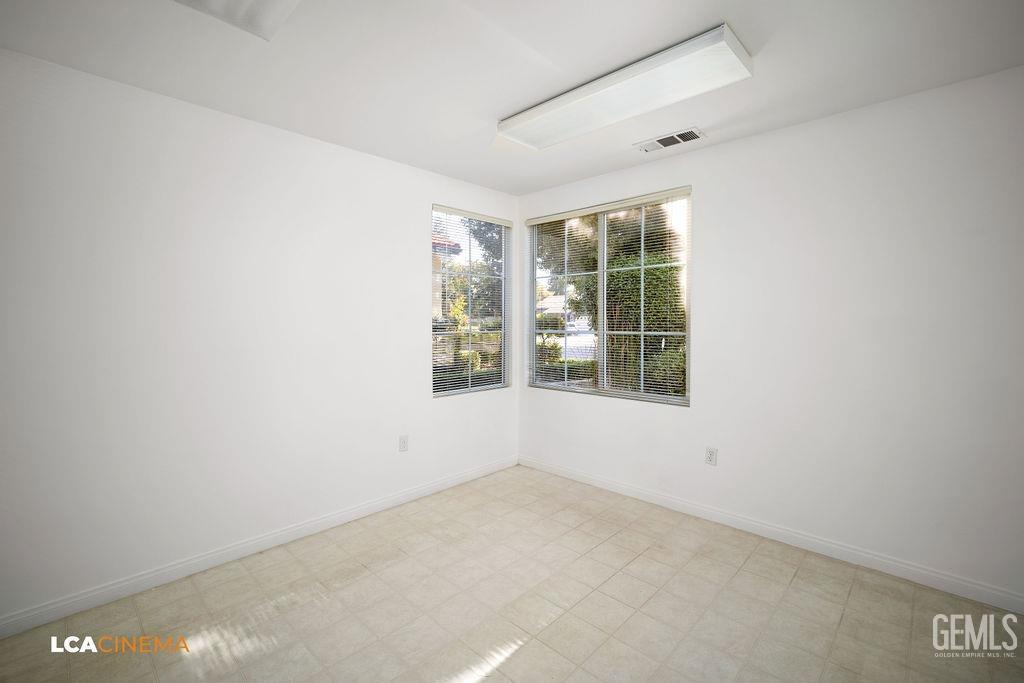 Undisclosed Address Bakersfield, CA 93312 - Photo 13 of 23 an empty room with windows