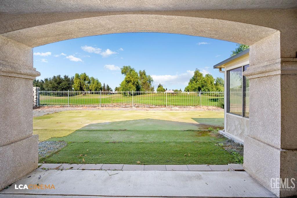 Undisclosed Address Bakersfield, CA 93312 - Photo 18 of 23 a view of a big yard with a swimming pool